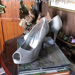 Fioni peep toe, stiletto, platforms.